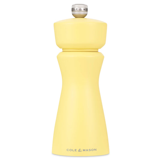 A pale yellowCole & Mason pepper mill grinder with a silver metal top cap, shown against a plain white background.