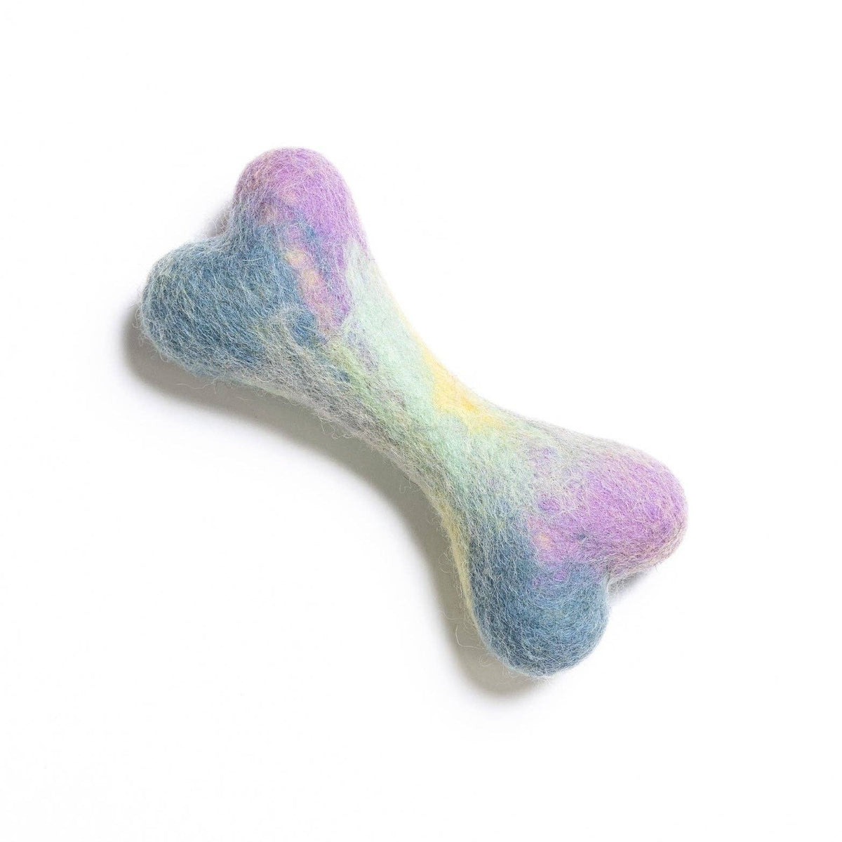 Colorful bone-shaped dog toy on a white background