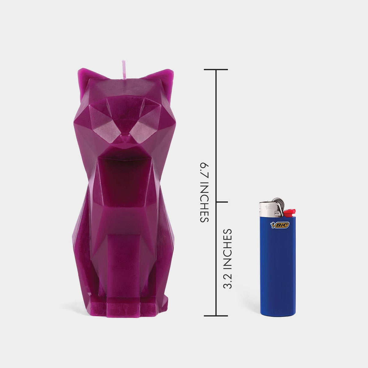 Purple geometric cat-shaped candle with dimensions and a lighter for scale on a white background