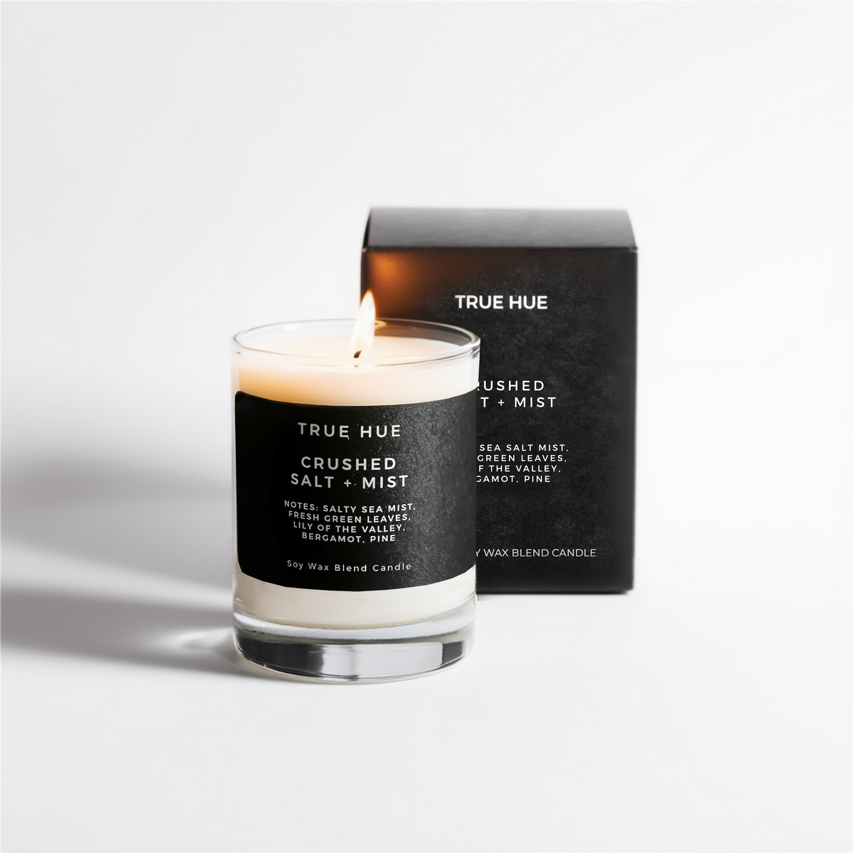 True Hue candle with packaging on a white background