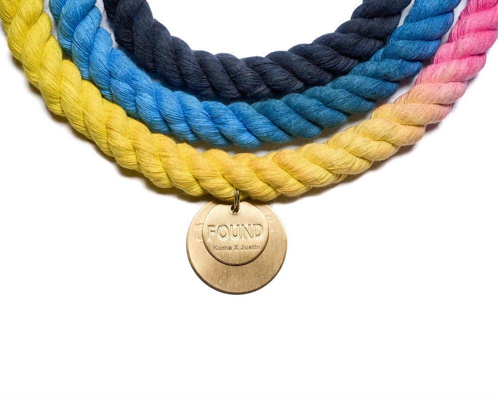 Colorful braided rope with a gold 'FOUND' tag on a white background