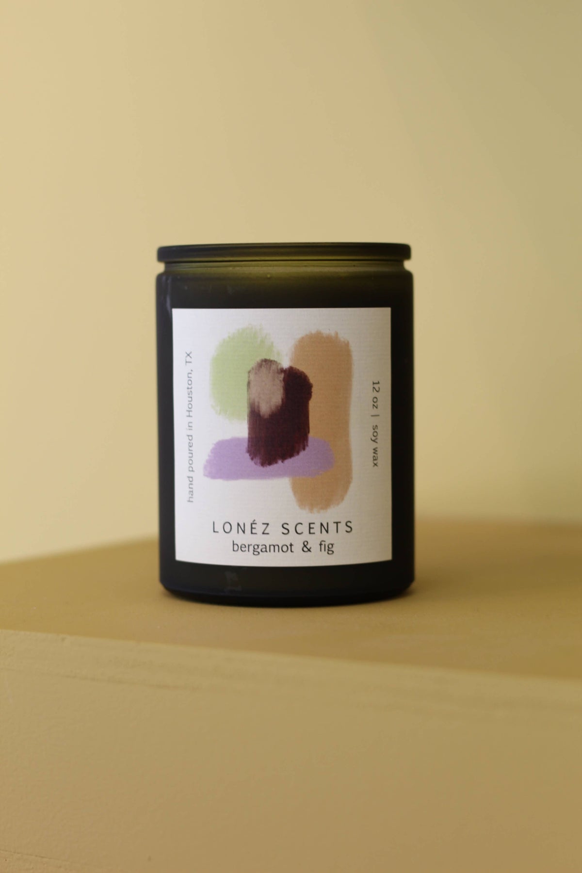 A handmade candle with an uplifting blend of citrus, coriander, vanilla orchid and sandalwood with a clean burn. 