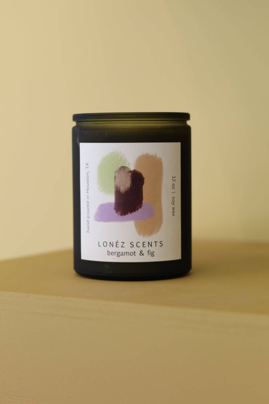 A handmade candle with an uplifting blend of citrus, coriander, vanilla orchid and sandalwood with a clean burn. 