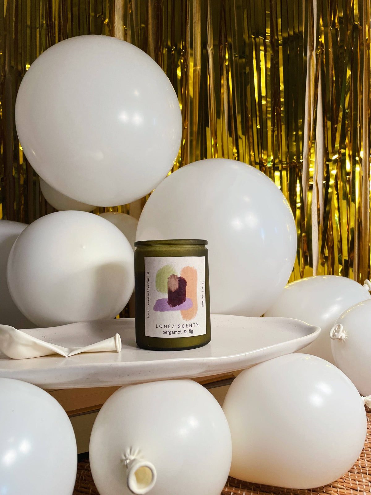 A handmade candle with an uplifting blend of citrus, coriander, vanilla orchid and sandalwood with a clean burn. 