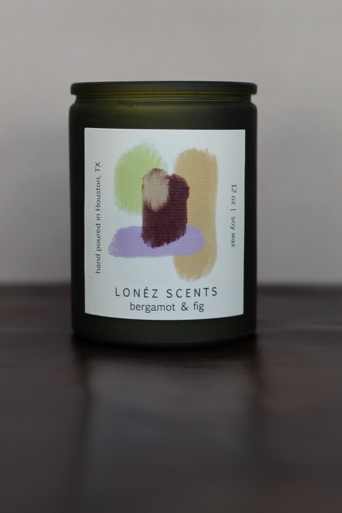 A handmade candle with an uplifting blend of citrus, coriander, vanilla orchid and sandalwood with a clean burn. 