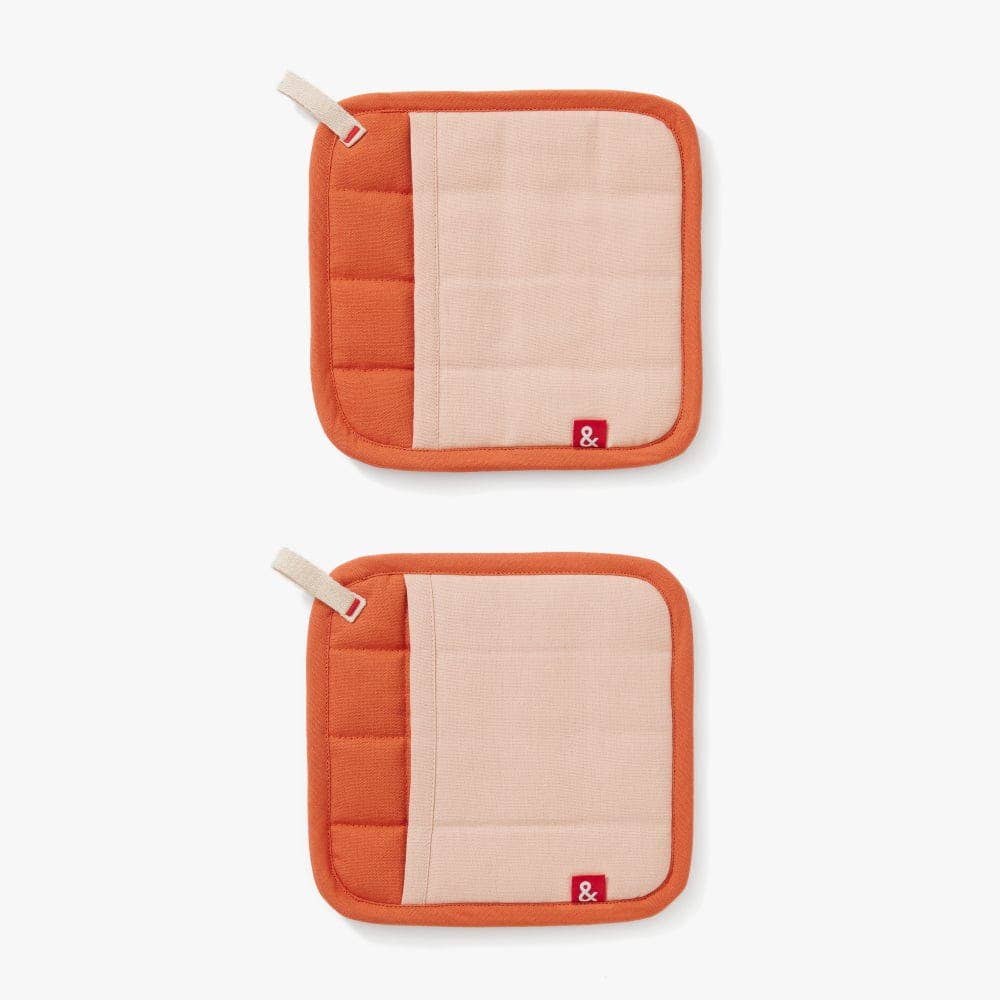 Two orange and beige pot holders with a brand logo on a white background