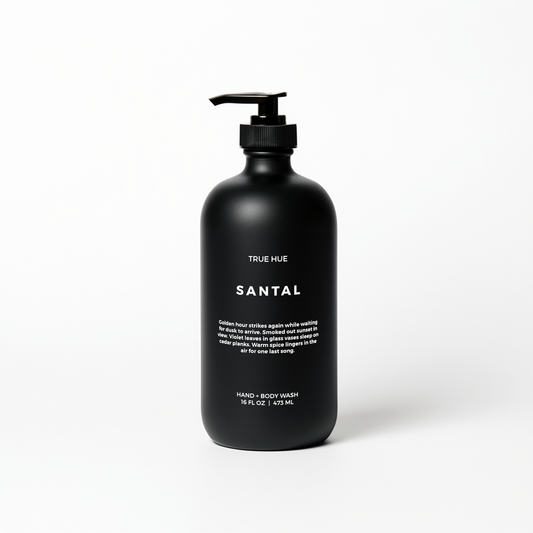 Black bottle of True Hue Bergamot + Black Tea hand and body wash on a white background