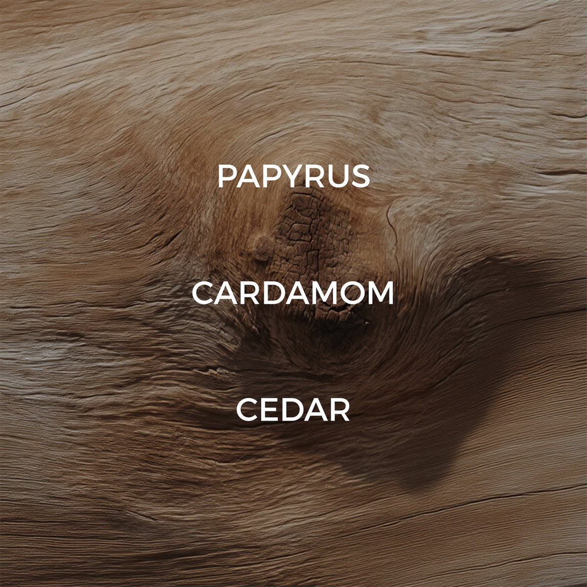 Wooden surface with 'Papyrus', 'Cardamom', and 'Cedar' labels.