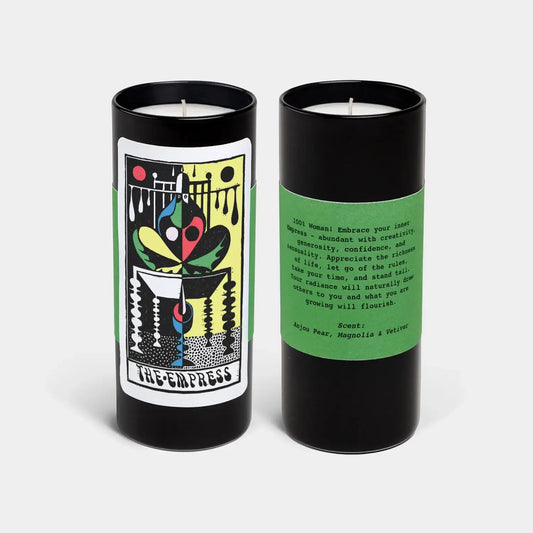 Two candles with artistic labels on a white background